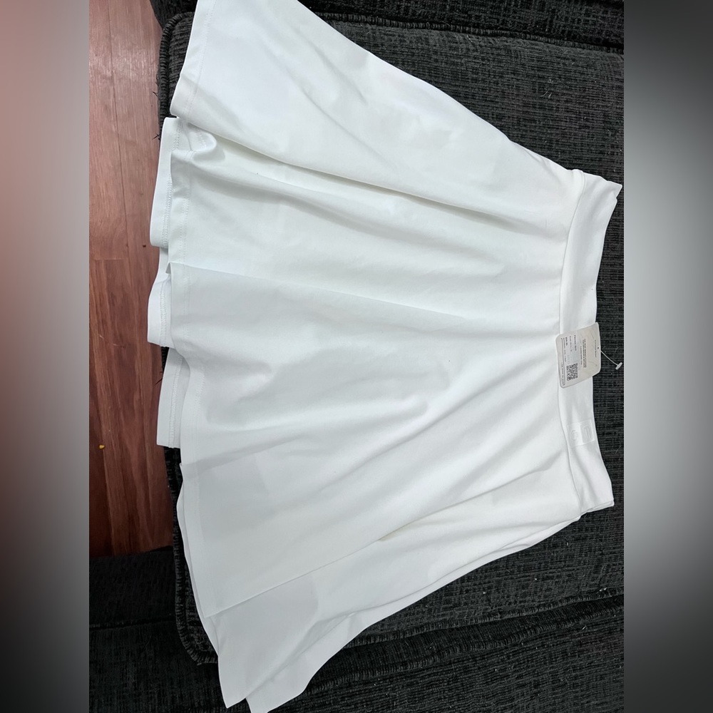 Fabletics BRAND NEW WITH TAGS skirt w/shirts built in.